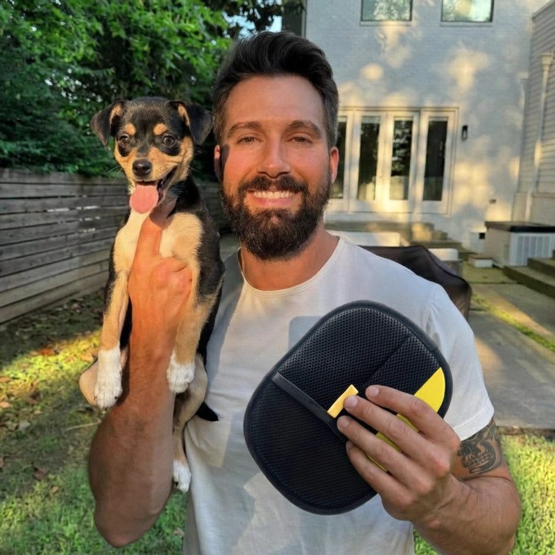 CleanPaw glove with a dog owner and their dog